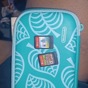 Nintendo switch games and carry case
